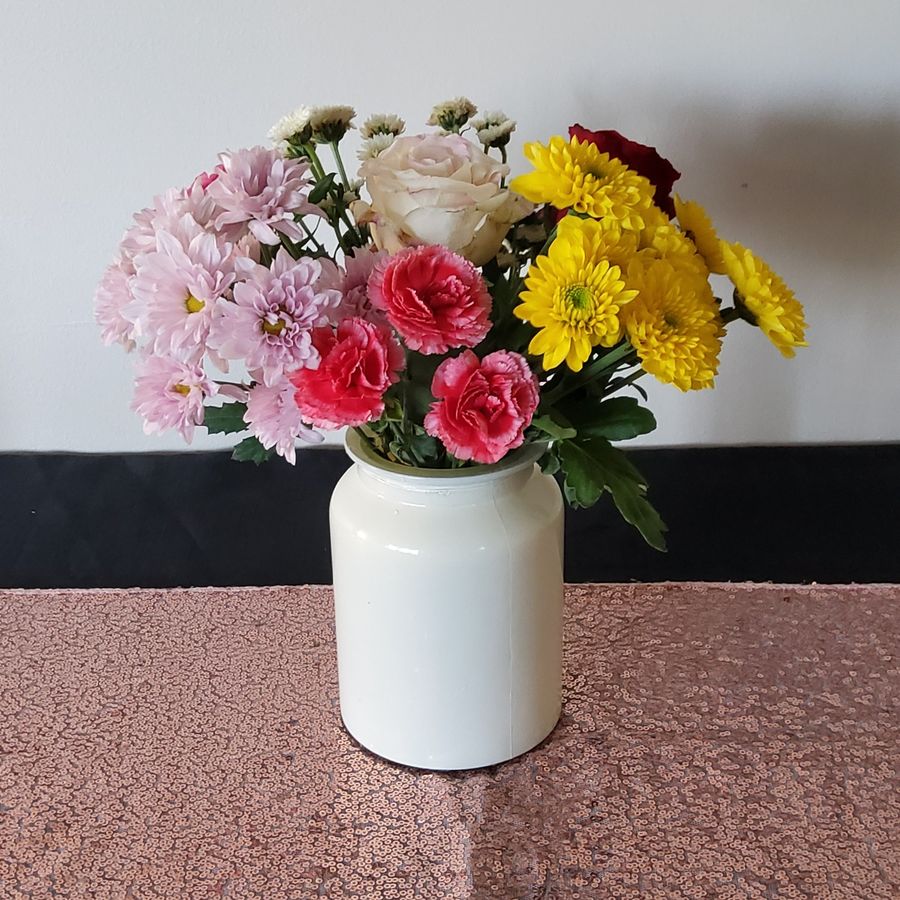 Vintage-style clear glass milk jar