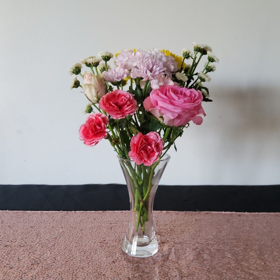 Clear glass pinched bud vase